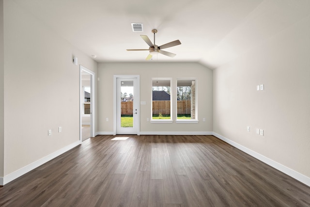 unfurnished room featuring lofted ceiling, ceiling fan, and dark hardwood / wood-style floors