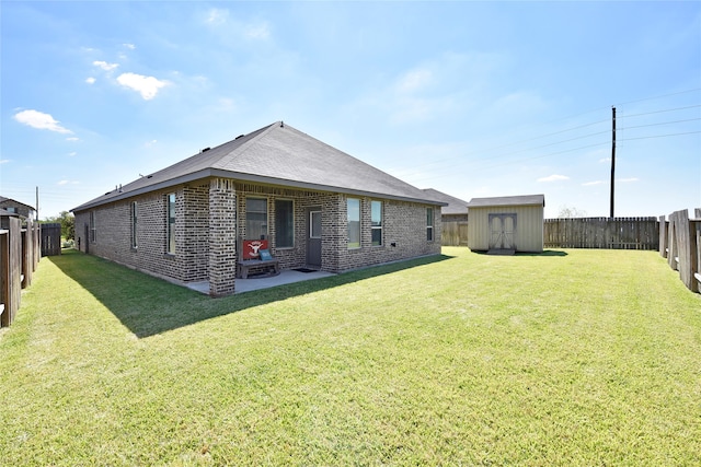 exterior space with a shed, a yard, and a patio