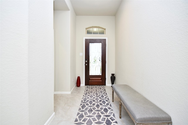 entrance foyer with light tile patterned floors