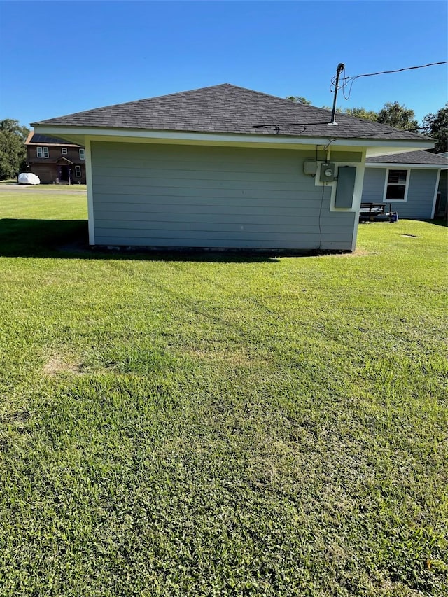 view of home's exterior featuring a yard