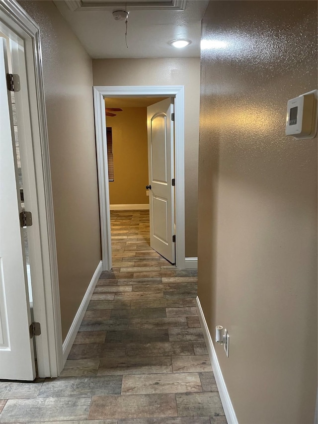 hall with dark hardwood / wood-style flooring