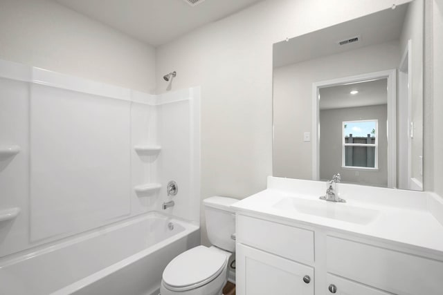 full bathroom featuring vanity, toilet, and shower / bath combination