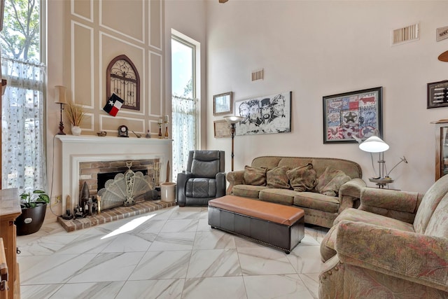 living room with a high ceiling