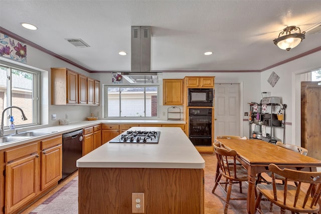 kitchen featuring a center island, sink, crown molding, island range hood, and black appliances