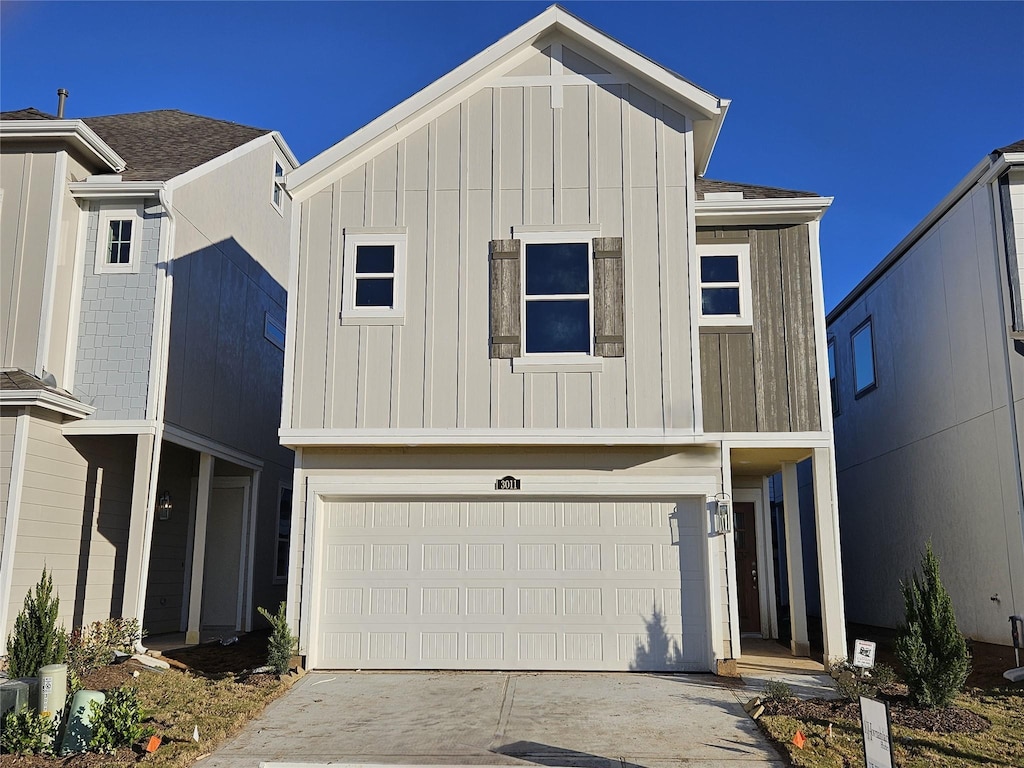 view of front of property featuring a garage