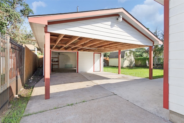 view of vehicle parking featuring a carport