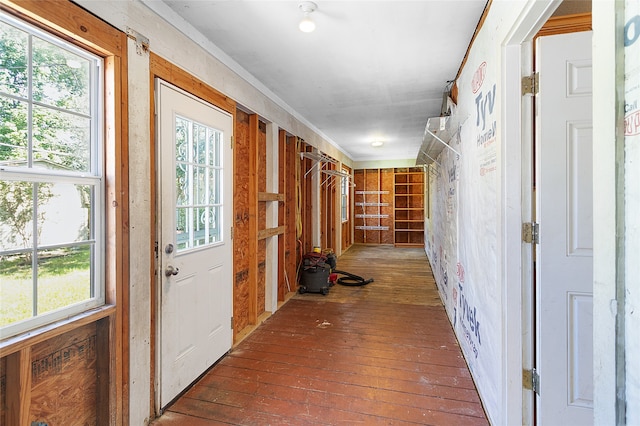 hall with dark hardwood / wood-style flooring