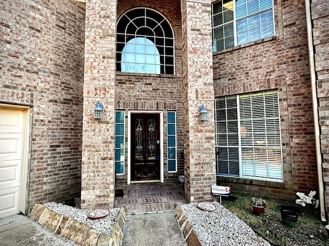 property entrance featuring a garage