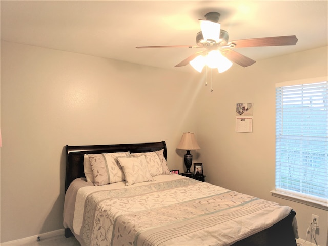 bedroom featuring ceiling fan