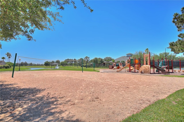 view of home's community with a playground and volleyball court