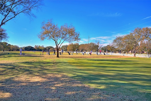 surrounding community featuring a lawn