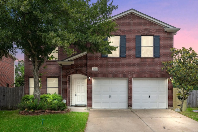 front of property featuring a garage