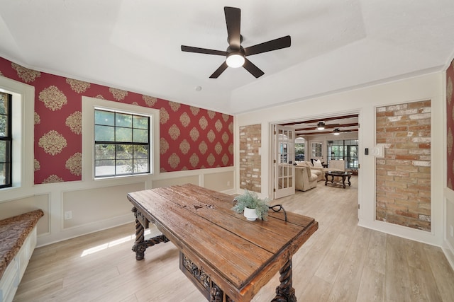 dining room featuring ceiling fan and light hardwood / wood-style flooring