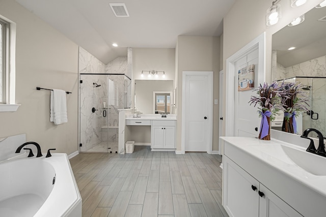 bathroom with vanity, plus walk in shower, and hardwood / wood-style floors