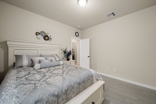 bedroom featuring light hardwood / wood-style flooring