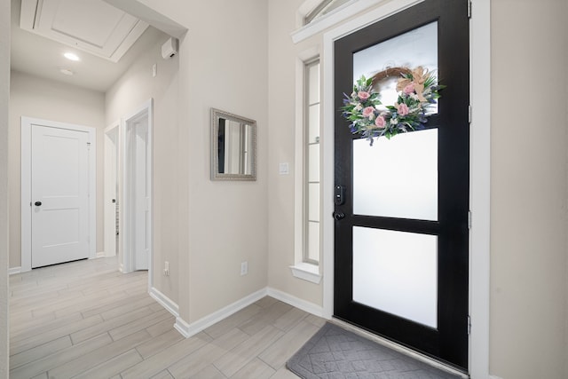 foyer with light wood-type flooring