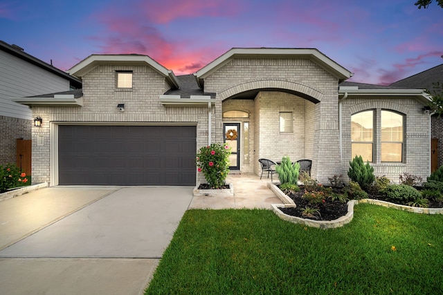 french provincial home featuring a lawn