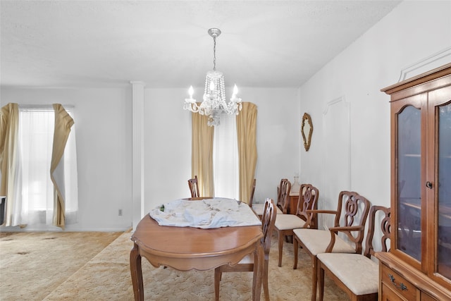 dining area featuring a chandelier