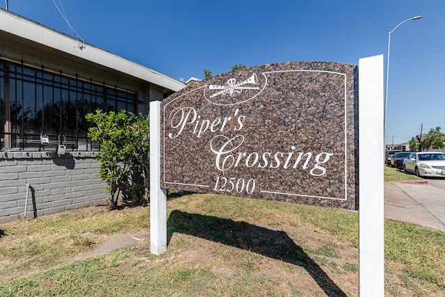 view of community sign