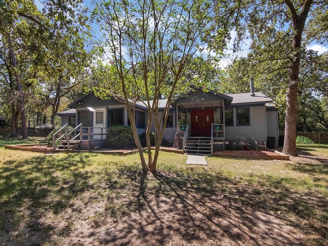 view of front of house with a front lawn