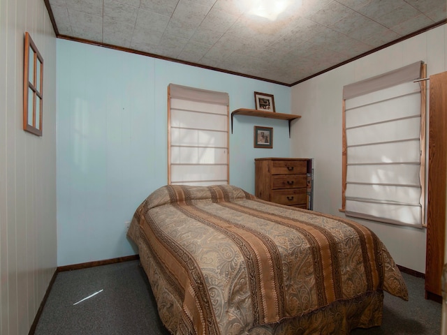 carpeted bedroom with crown molding