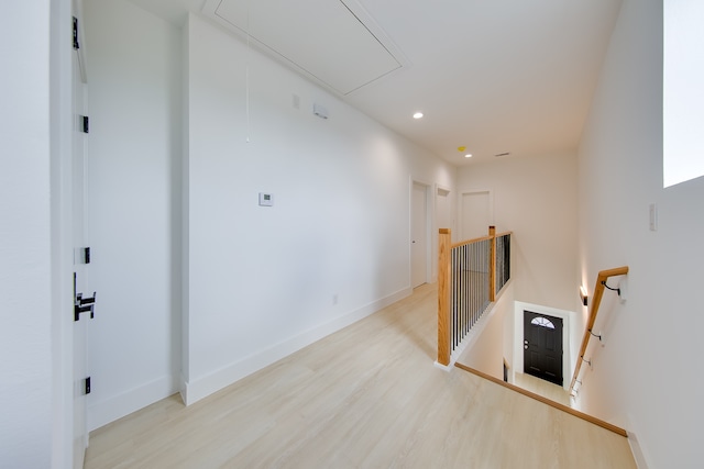 unfurnished room featuring light hardwood / wood-style floors