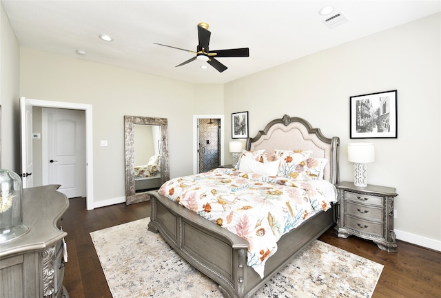 bedroom with ceiling fan and dark hardwood / wood-style floors