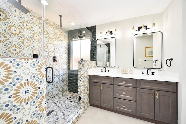 bathroom with vanity, tile patterned floors, and a shower with shower door