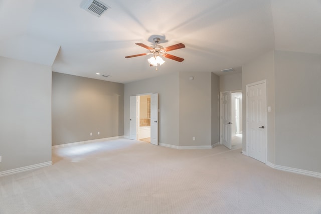 empty room with ceiling fan and light colored carpet