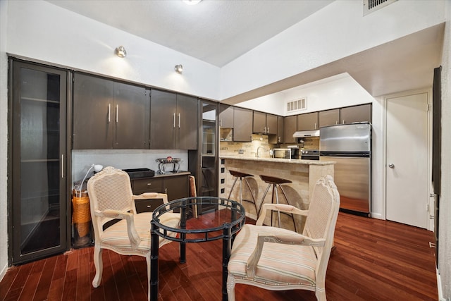 interior space with dark hardwood / wood-style floors and sink