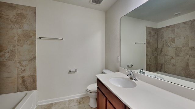 full bathroom featuring tiled shower / bath combo, vanity, tile patterned flooring, and toilet