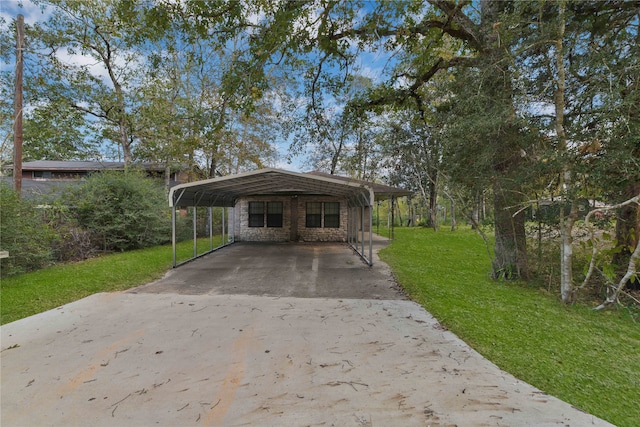 view of car parking with a carport and a yard