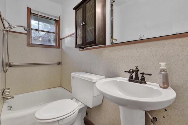 full bathroom with tub / shower combination, toilet, and sink