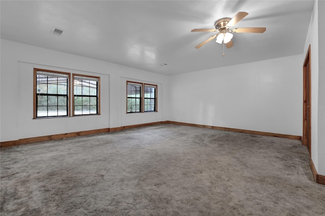 unfurnished room with carpet floors and ceiling fan