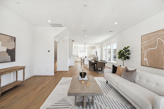 living room featuring light wood-type flooring