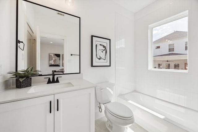 full bathroom with tile patterned floors, shower / tub combination, vanity, and toilet