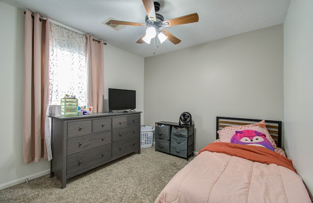 carpeted bedroom with ceiling fan