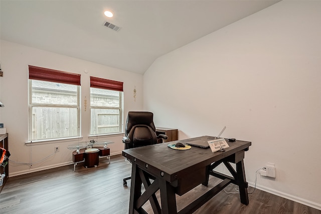 office featuring dark hardwood / wood-style floors and vaulted ceiling