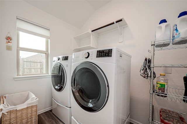 laundry area featuring dark hardwood / wood-style floors and separate washer and dryer