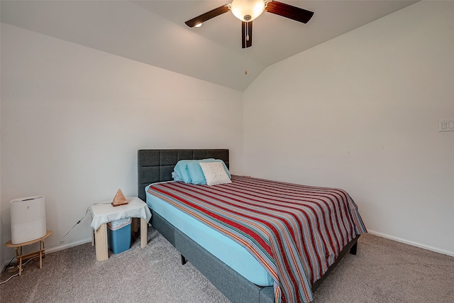 bedroom featuring ceiling fan, lofted ceiling, and carpet