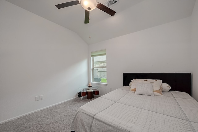 bedroom featuring ceiling fan, lofted ceiling, and carpet