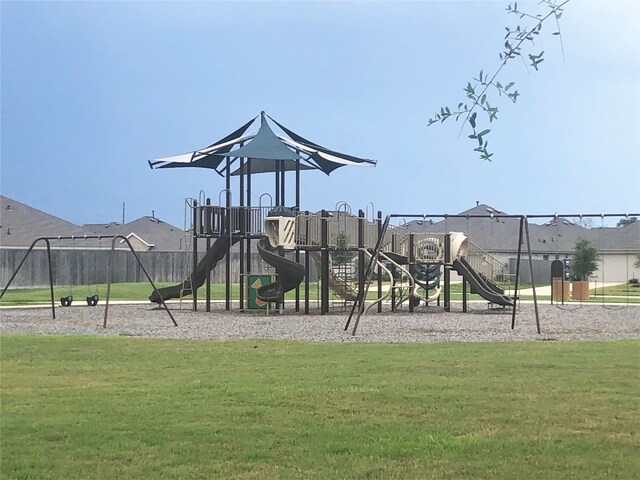 view of jungle gym with a yard