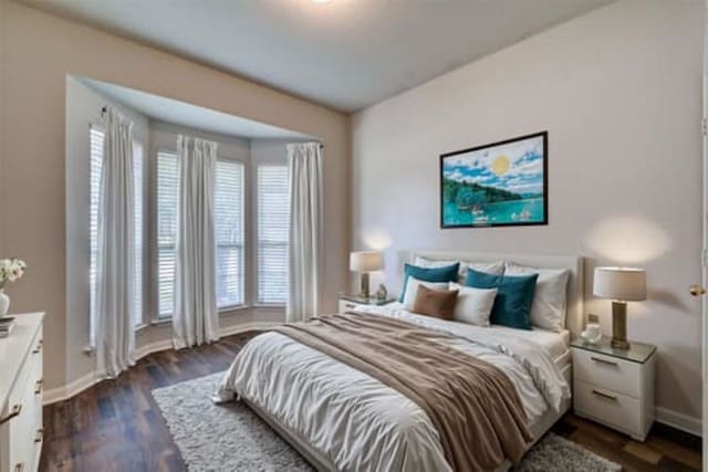 bedroom featuring dark hardwood / wood-style floors