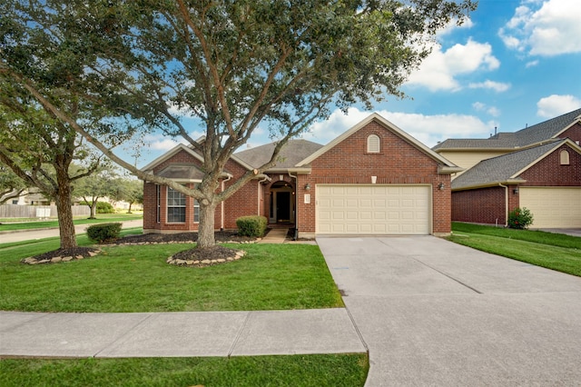 view of property with a front yard and a garage