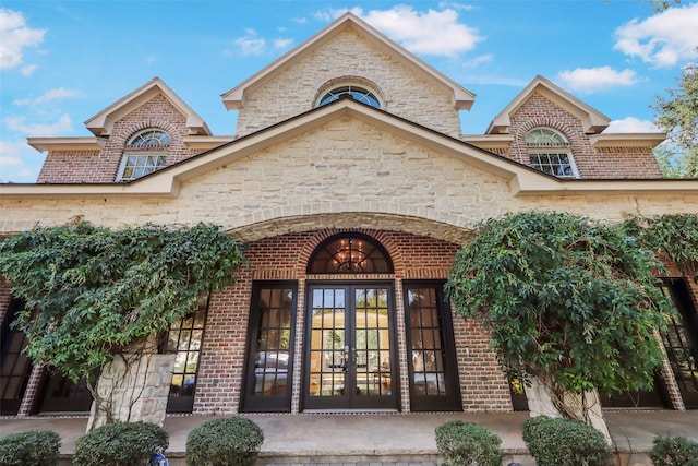 doorway to property with french doors