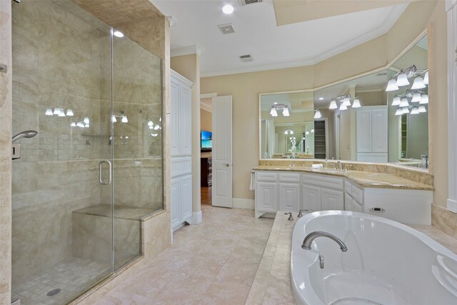 bathroom with vanity, crown molding, and plus walk in shower