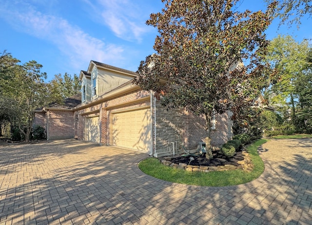 view of home's exterior with a garage