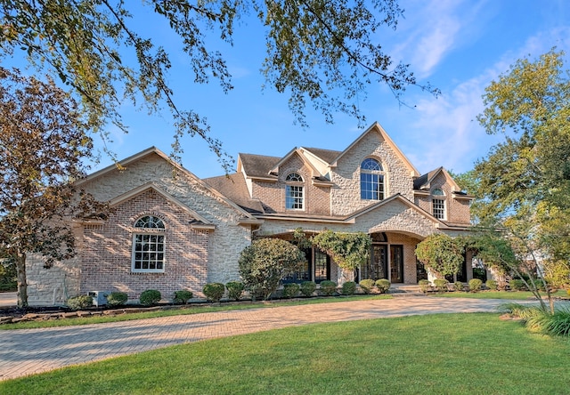 view of front of home with a front yard