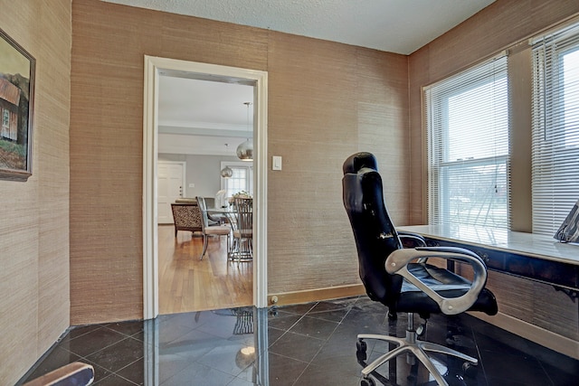 office space with dark tile patterned flooring