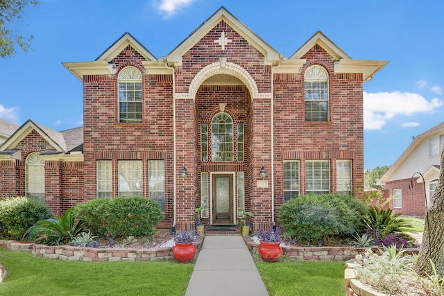 view of front facade featuring a front yard